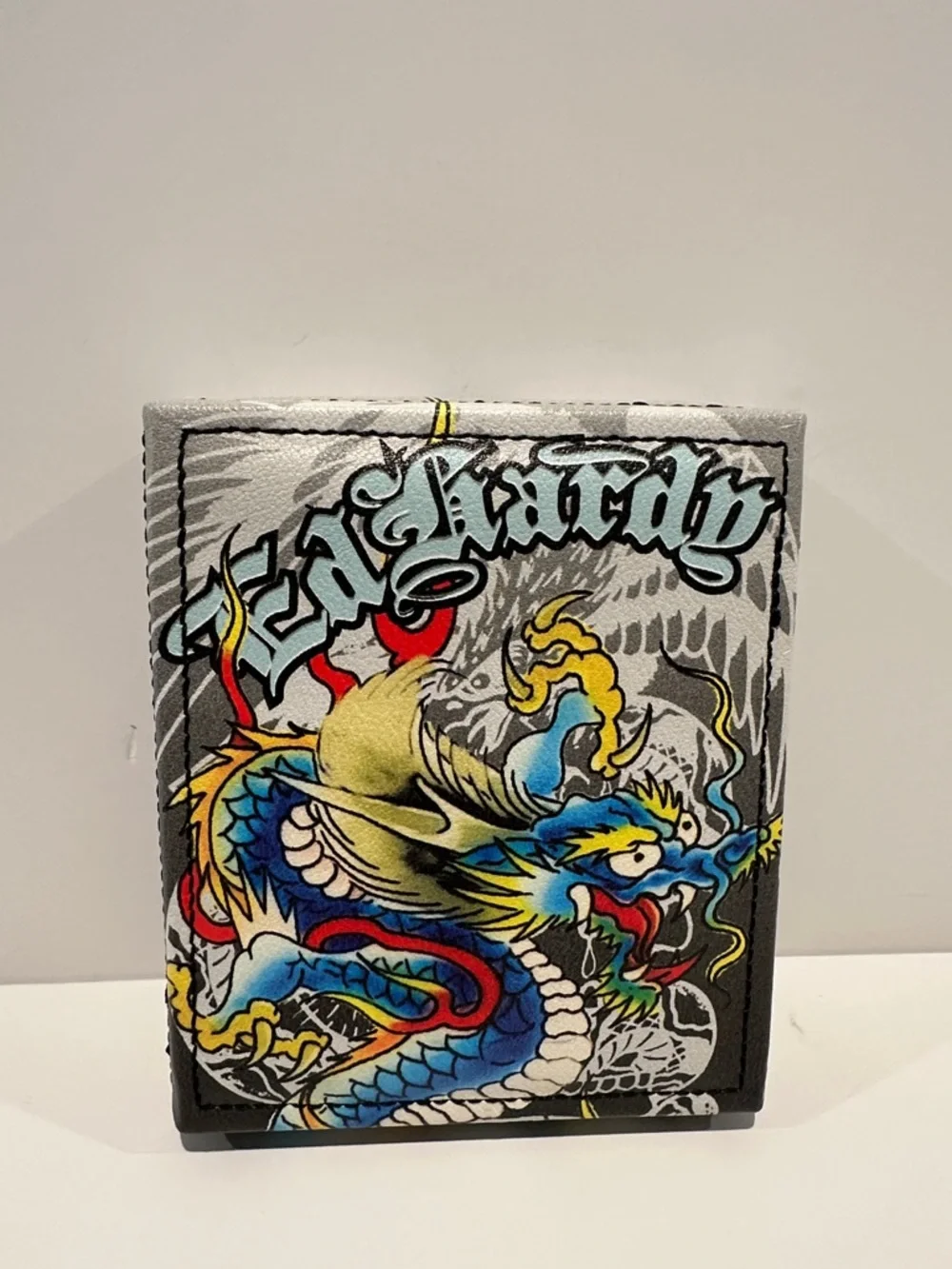 NWT Ed Hardy Men’s Bifold Wallet with Card, ID, Coin and Bill slots.